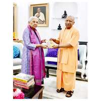 UP CM Yogi Adityanath marks 8 years in office, meets Governor Anandiben Patel