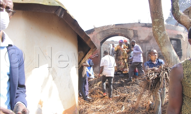 Buganda sleeps easy after Kasubi Tombs fire is put out Buganda sleeps easy after Kasubi Tombs fire is put out