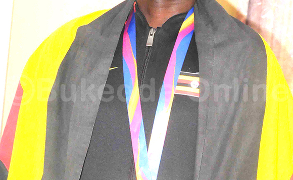 DAVID Emong eyawangudde omudaali gwa Zaabu ng'annyonyola .Baabadde ku kitebe ky'abalema ekya UUDIP e Ntinda, July 27 2017. (ekif:Silvano Kibuuka) DAVID Emong eyawangudde omudaali gwa Zaabu ng'annyonyola .Baabadde ku kitebe ky'abalema ekya UUDIP e Ntinda, July 27 2017. (ekif:Silvano Kibuuka)