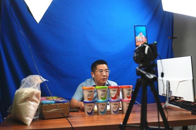 Million views for live-streamed village meetings: remote village pioneers digital hall