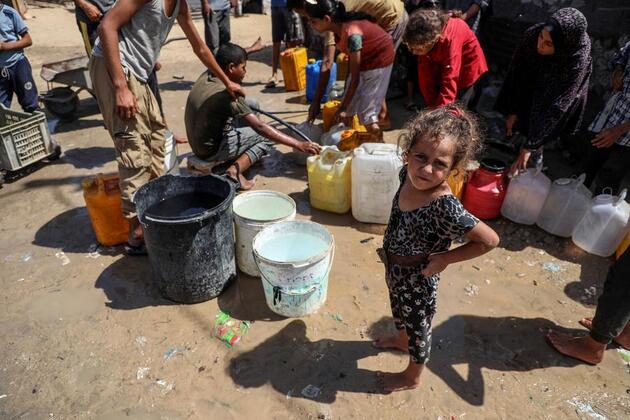 Feature: Heavier burdens, deeper resilience -- Gaza women after two years into conflict