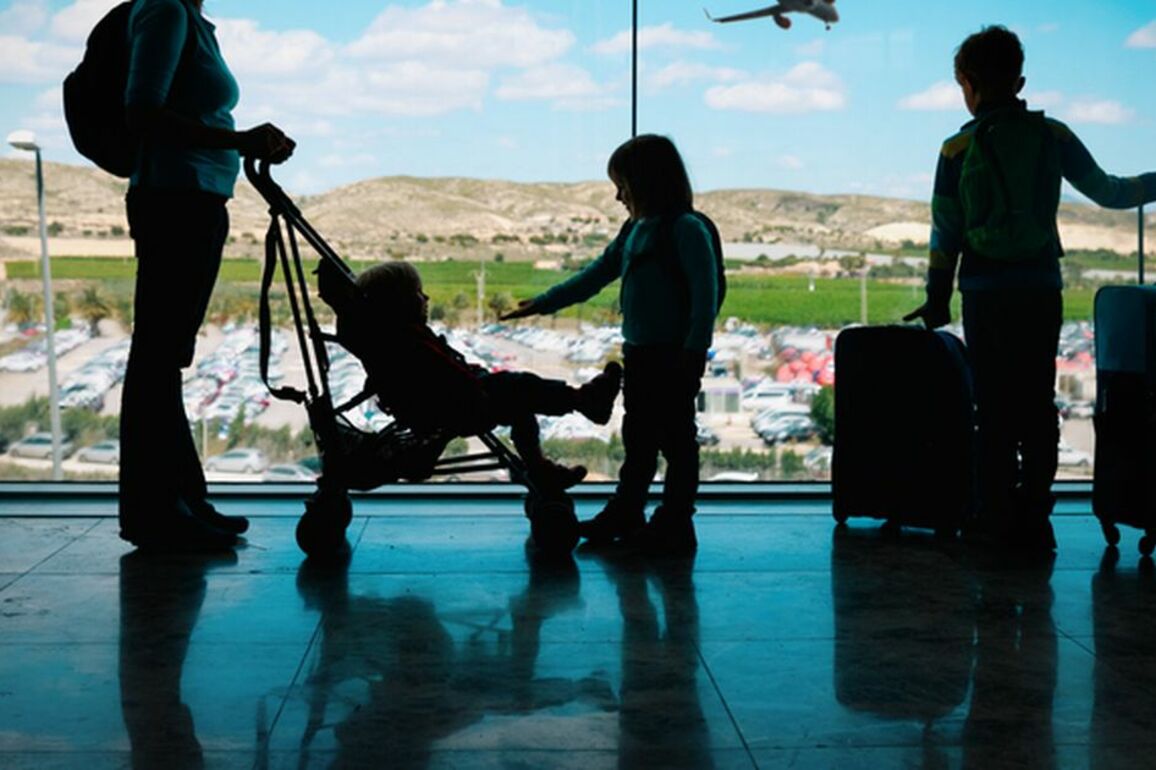 Mum shares why she always dresses kids in matching outfits at the airport