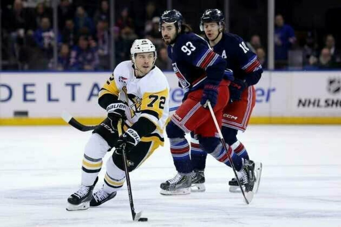 Missing pair of stars, Penguins rally past Rangers