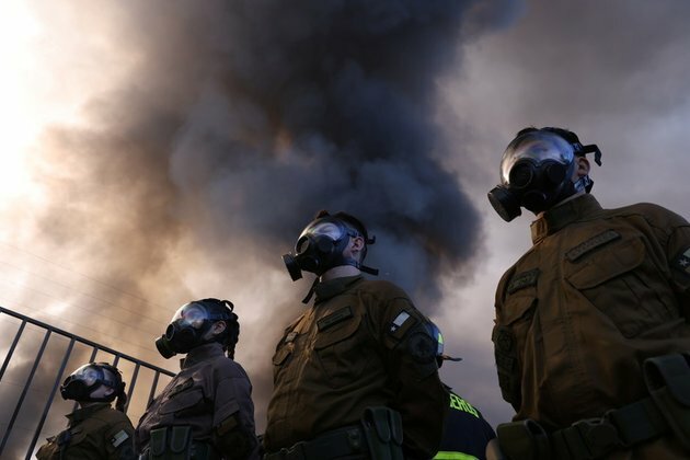 Schools close as toxic smoke cloud swirls over Santiago