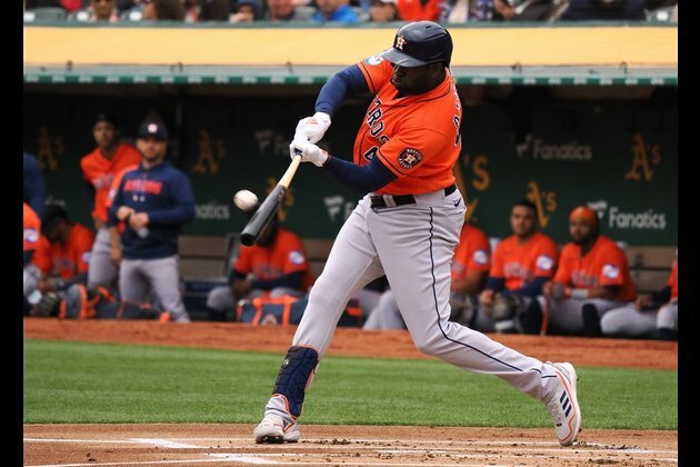Astros smack season-high 7 homers in 10-1 rout over A's