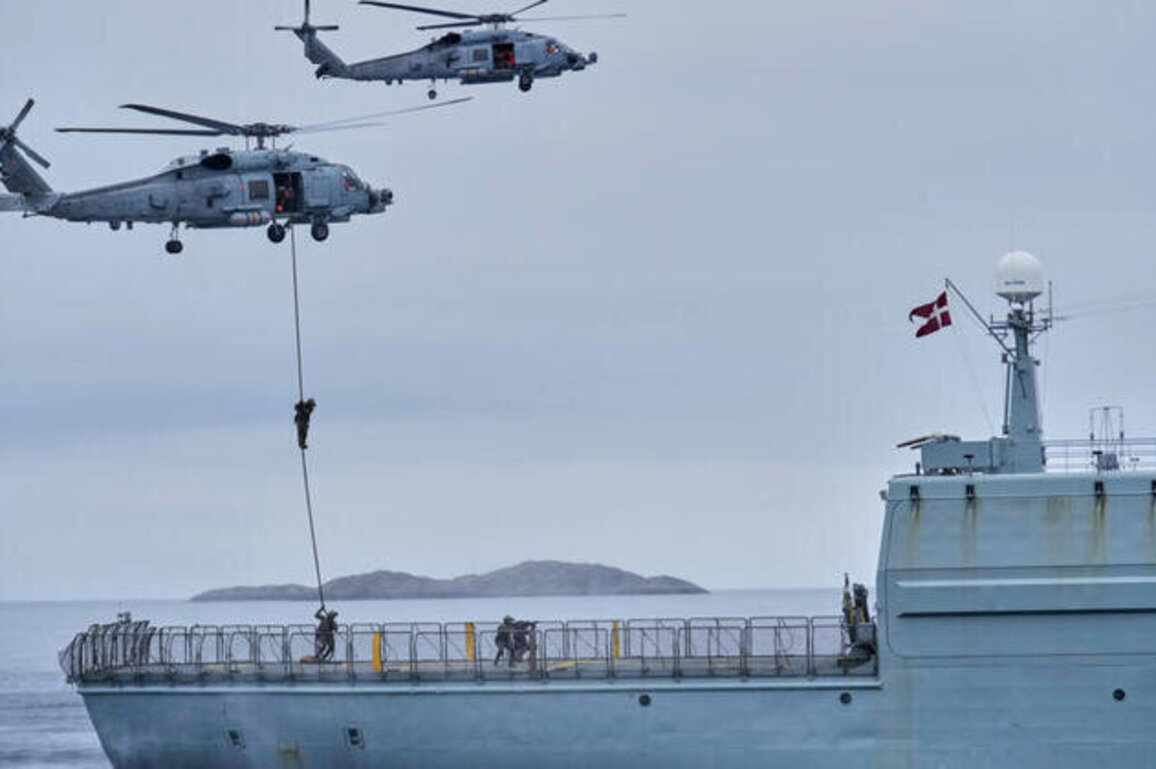 Danish PM urges US to stop "threatening" to take control of Greenland