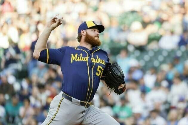 Brewers look to Brandon Woodruff, try to avoid sweep by Marlins