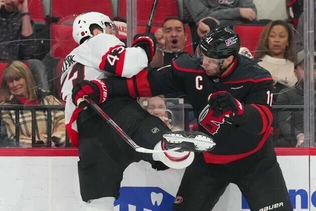 Hurricanes blow lead, come back to edge Senators