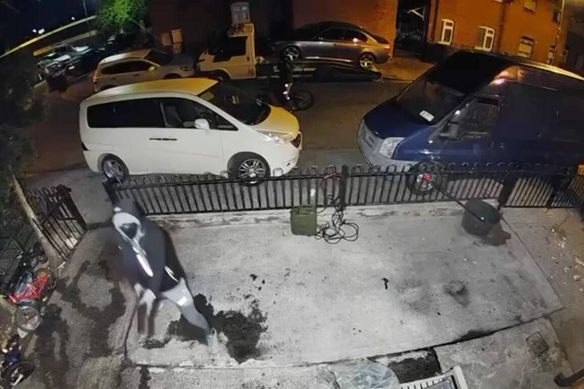 Shocking CCTV shows masked gunman open fire on house as family sleep inside