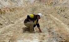  Dean Goodwin examining the ore at 14m below surface.