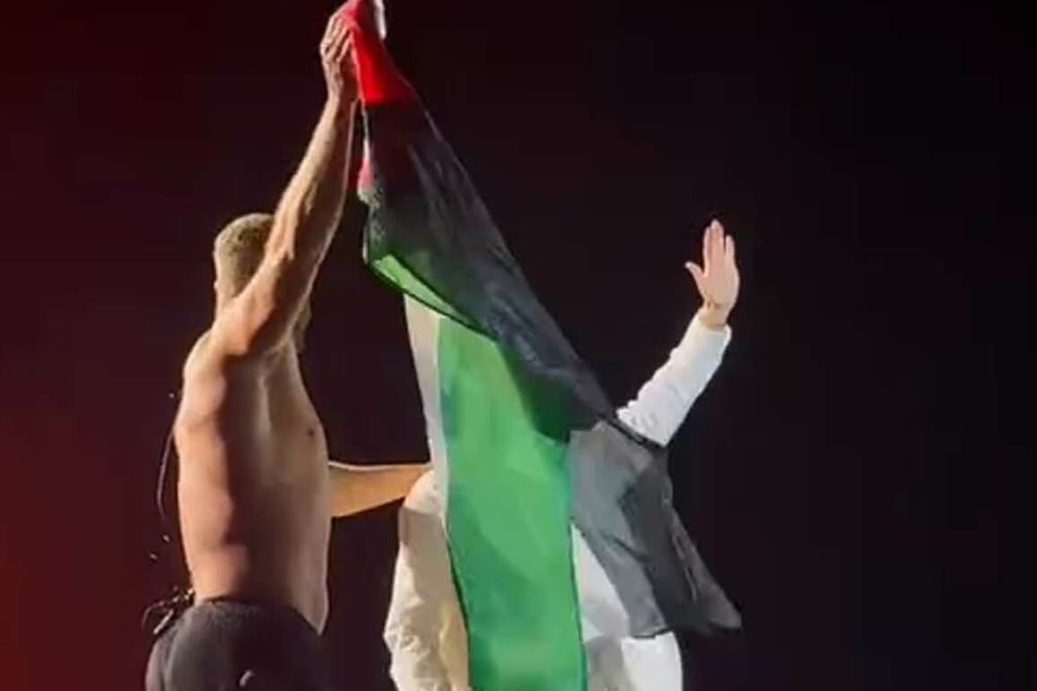Chart-topping rock band sparks major backlash after waving Palestinian flag on stage