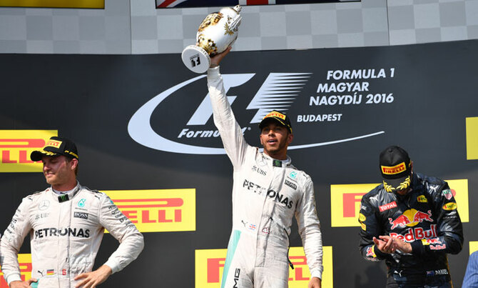 Hamilton wins in Hungary to claim overall lead Hamilton wins in Hungary to claim overall lead