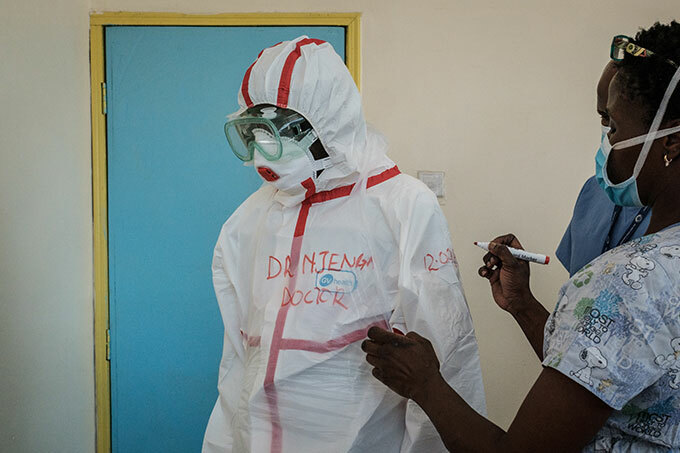   doctor and laboratory specialists get ready with protective gears before visiting the ward for quarantined people who had close contacts with the first enyan patient of the 19 at the nfectious isease nit of enyatta ational ospital in airobi enya on arch 15 2020 during the 19 outbreak caused by the novel coronavirus  enya announced on arch 13 2020 the first confirmed case of coronavirus in ast frica as the region so far unscathed by the global pandemic scaled up emergency measures to contain its spread  27yearold enyan woman tested positive for the virus on arch 12 in airobi a week after returning from the nited tates via ondon hoto 