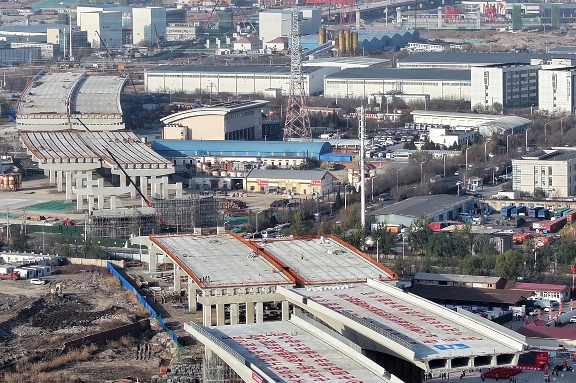 Economy | Twin swivel bridges of the Xinggang expressway complete rotation in N China's Tianjin