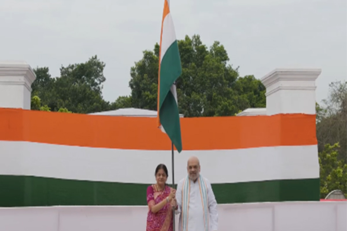 Har Ghar Tiranga campaign: Union Home Minister Amit hoists Indian flag at his residence in New Delhi