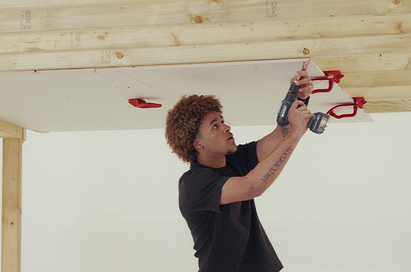 New board aid tool designed to make plasterboard ceiling installation easier