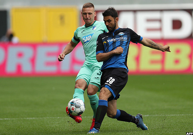  aderborns erman midfielder errit oltmann battled for the ball with offenheims zech defender avel aderabek