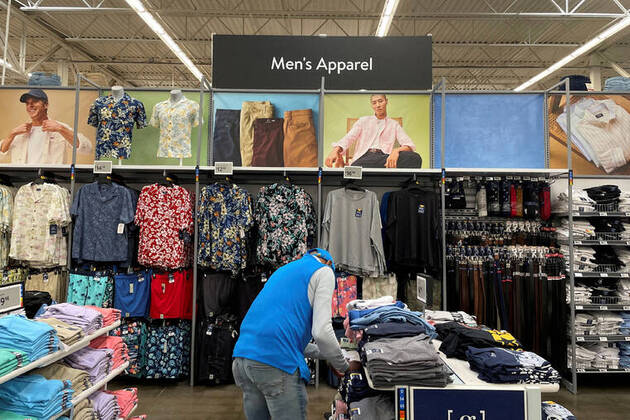 Cheaper gas holds down U.S. consumer prices; core inflation heats up