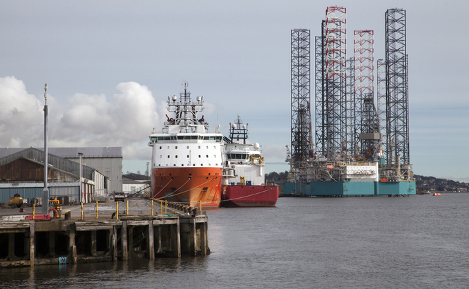 Two boats and a semi-submersible exploration drilling rig docked at the quayside on the River Tay at Dundee, Scotland | Credit: iStock