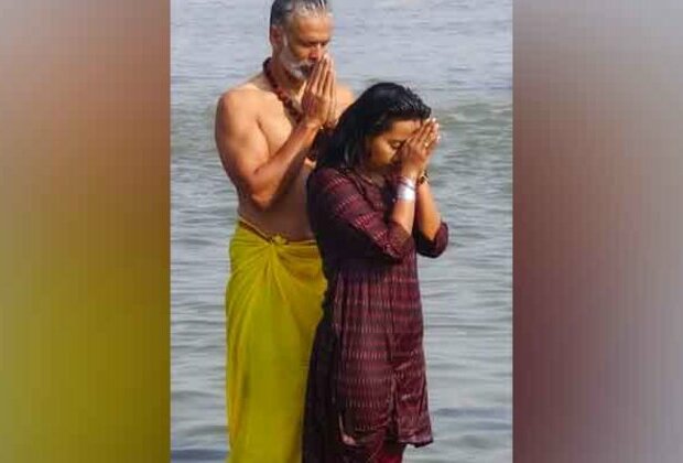 Actor-model Milind Soman takes dip in Sangam with wife Ankita Konwar