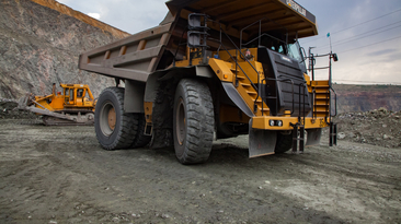 Caterpillar quarry truck transporting iron ore in Kazakhstan