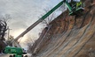 Soil nails being installed up to 20 linear feet deep on a grid pattern of 6ft by 6ft and 8ft by 8ft, by GeoStabilization International to provide robust support to an unstable slope in Lynchburg, Virginia. Credit: GeoStabilization International 