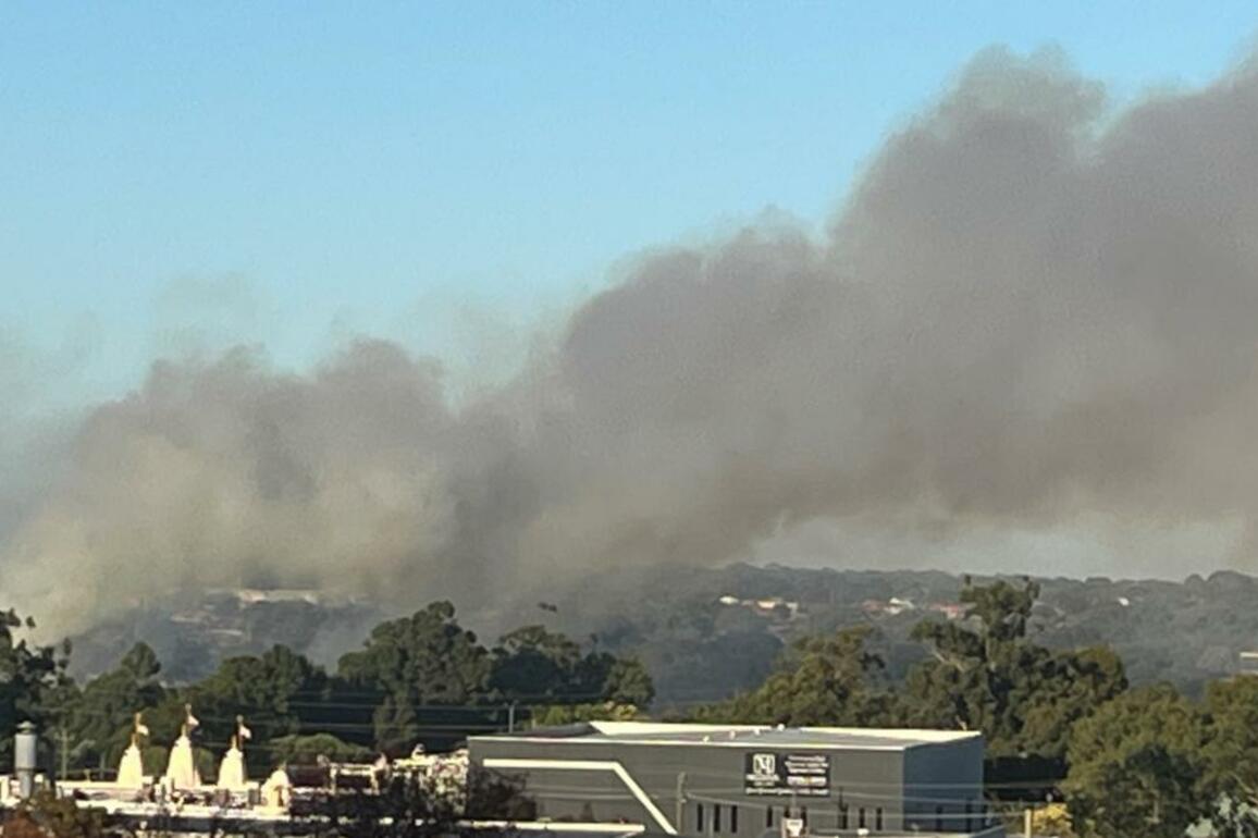 Woodvale fire- Water bombers fighting bushfire burning in Yellagonga Park in northern suburbs