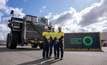  FFI team members with a Liebherr truck in Perth