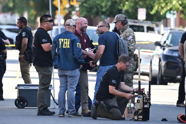 California gunman killed after taking 10 school staff hostage in 16-hour bank siege