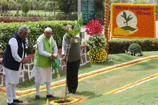 PM plants sapling of Peepal tree at Buddha Jayanti Park in Delhi