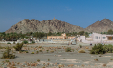 View of Ibra town with watchtowers on hills, Oman. Photo: Matyas Rehak / Shutterstock