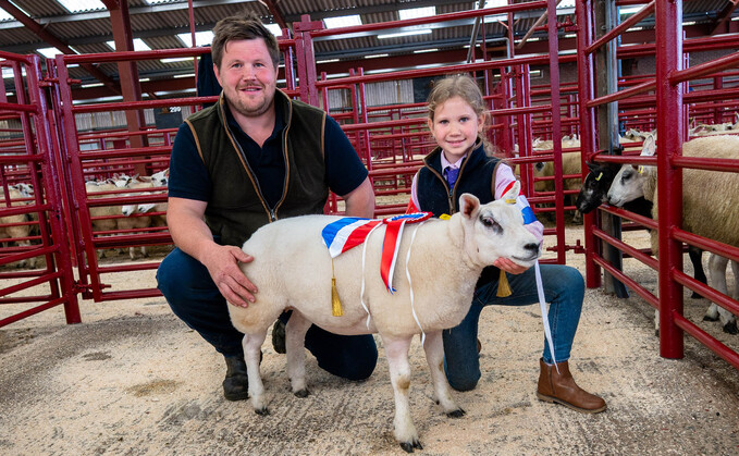 Championship winner Evie Craig, Glenhowan, with her 40kg Beltex lamb and judge Ben Haigh. 