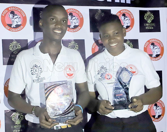  ansoor wanika and ashida utesi pose with their trophies after the tournament