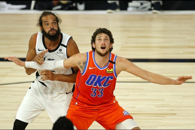 Mann helps Clippers top Thunder in OT