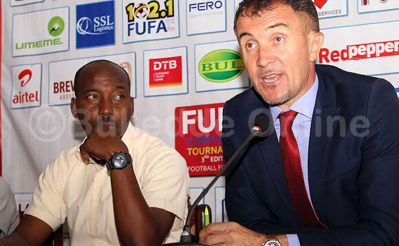 Omutendesi wa Cranes Micho Sredojevich (ku ddyo) ng'ayanjula entekateeka y'okwetegekera omupiira gwa Cape Verde ogugulawo kampeyini y'okusunsulamu abalizannya mu mpaka z'omupiira gwa Africa ez'akamalirizo ezigenda okutegekebwa Cameroon mu 2019. Ku kkono ye Ahmed Hussein omwogezi wa FUFA. (STEPHEN MAYAMBA) Omutendesi wa Cranes Micho Sredojevich (ku ddyo) ng'ayanjula entekateeka y'okwetegekera omupiira gwa Cape Verde ogugulawo kampeyini y'okusunsulamu abalizannya mu mpaka z'omupiira gwa Africa ez'akamalirizo ezigenda okutegekebwa Cameroon mu 2019. Ku kkono ye Ahmed Hussein omwogezi wa FUFA. (STEPHEN MAYAMBA)