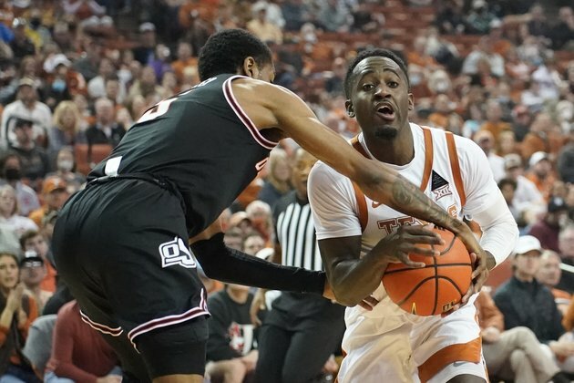 Second-half surge gets No. 23 Texas past Oklahoma State