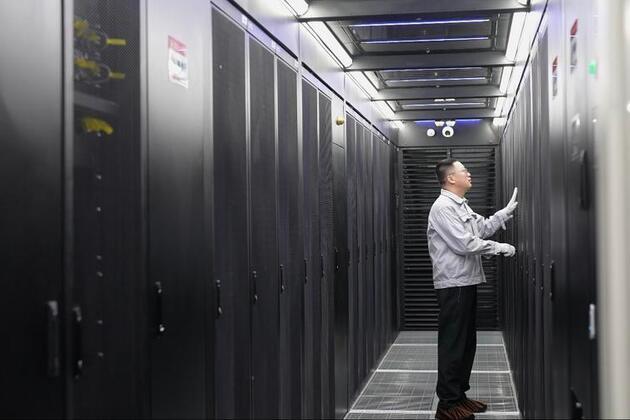 Data center engineers working silently behind booming AI services