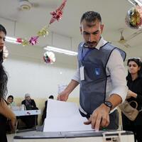 Iraqis vote in pivotal parliamentary elections, seeking stability and reform
