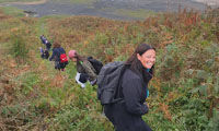 James Burrell staff take coastal walk for community access defibrillator