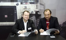 Paul Douglas, director and general manager of Terex Trucks, with Alexander Bonev, marketing director of Eurasia