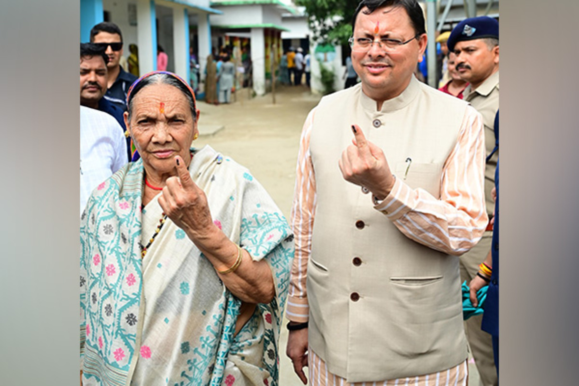 Uttarakhand: CM Dhami and mother Bishna Devi cast vote for three-tier Panchayat elections