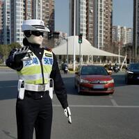 China's robot police patrol cities during Labor Day holiday, signaling AI-powered urban governance