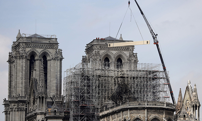 Race on to cover Notre-Dame as rainclouds gather over Paris Race on to cover Notre-Dame as rainclouds gather over Paris