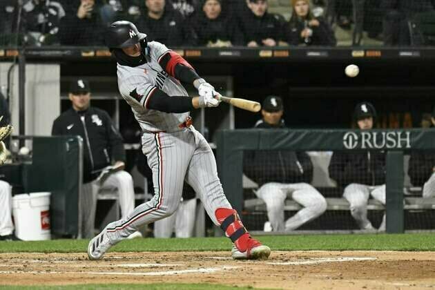 Twins ride 5-run inning to beat White Sox, get first win