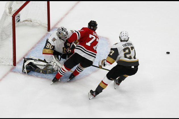 Kirby Dach (wrist) back practicing with Blackhawks