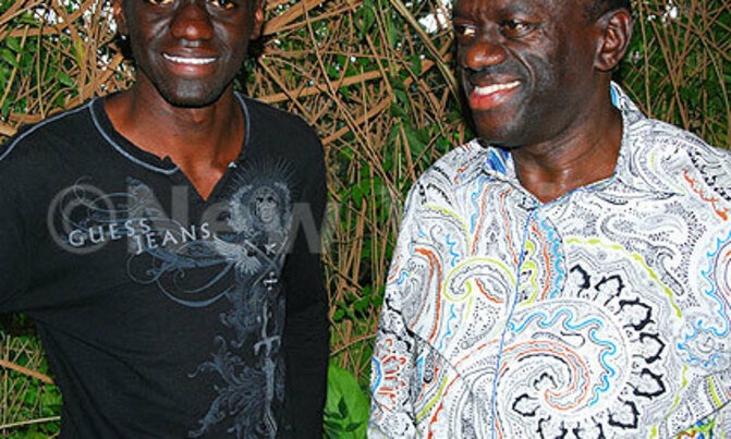 Besigye meets his look-alike Besigye meets his look-alike