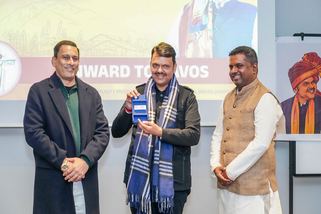 Davos: CM Fadnavis accepts World Economic Forum badge representing 'Magnetic Maharashtra'; praises diaspora for cultural connect