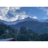 Himachal Pradesh: Dhauladhar Mountain range receives snowfall, temperature dips