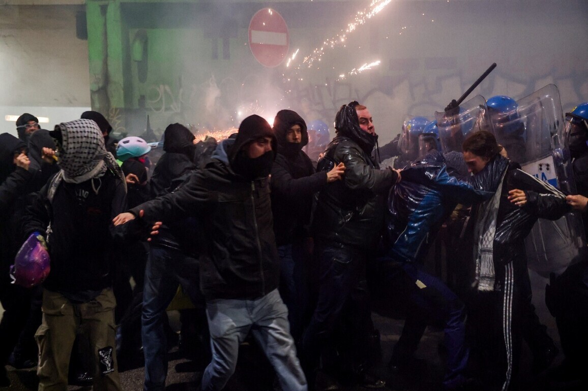 Anti-Olympics protest in Milan turns violent as Italy probes suspected railway sabotage