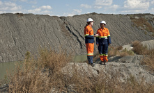  Dr Evelyn Mervine and geologist Zandile Miya amongst some fine kimberlite tailings at De Beers’ Voorspoed mine in South Africa